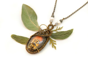 Collier « Janus aux deux visages »
